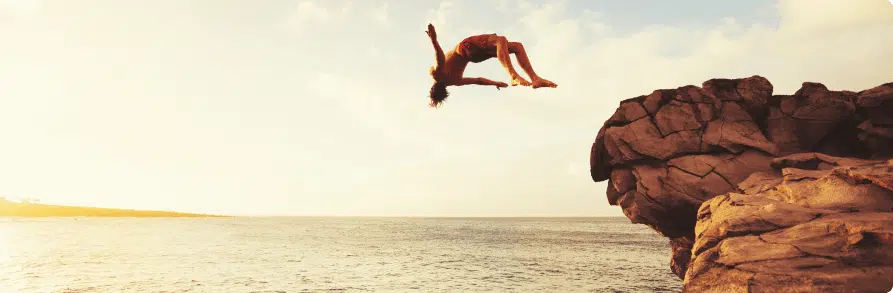 Man cliff jumping